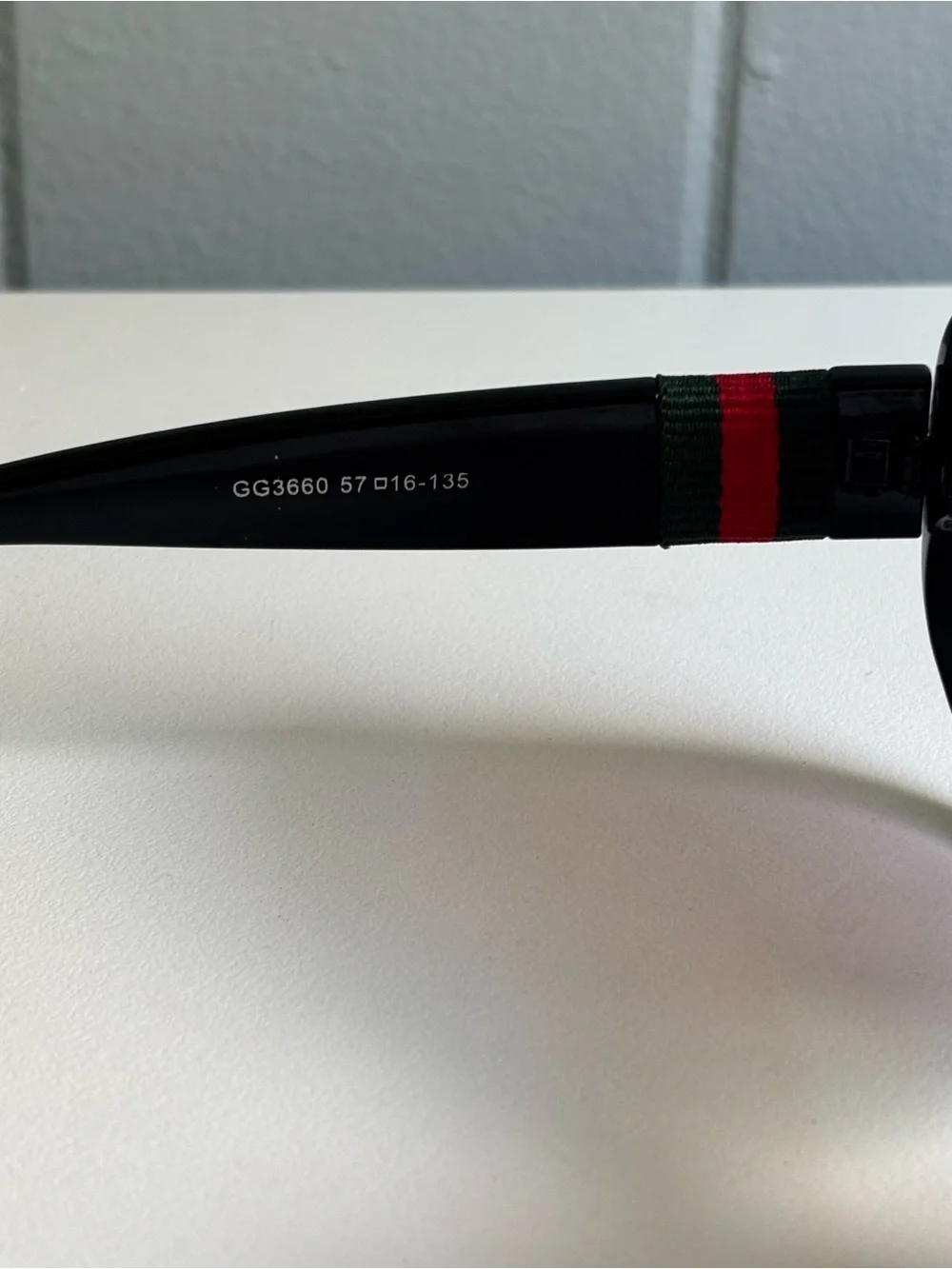 Gucci Black Frame Sunglasses with Purple Gradient Lenses